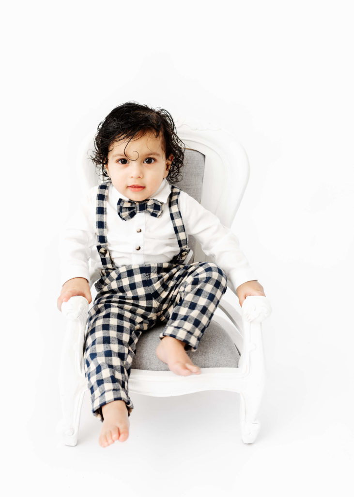 Baby in a Miniature Vintage Chair at a Cake smash photo session by Hobart Based Photographer Lauren Vanier 