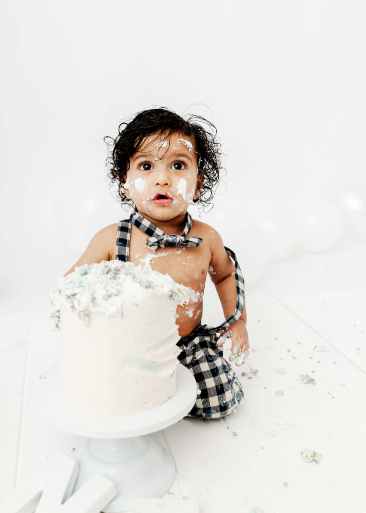 Baby with a Cake at a Cake Smash Photoshoot in Hobart by Lauren Vanier Photography